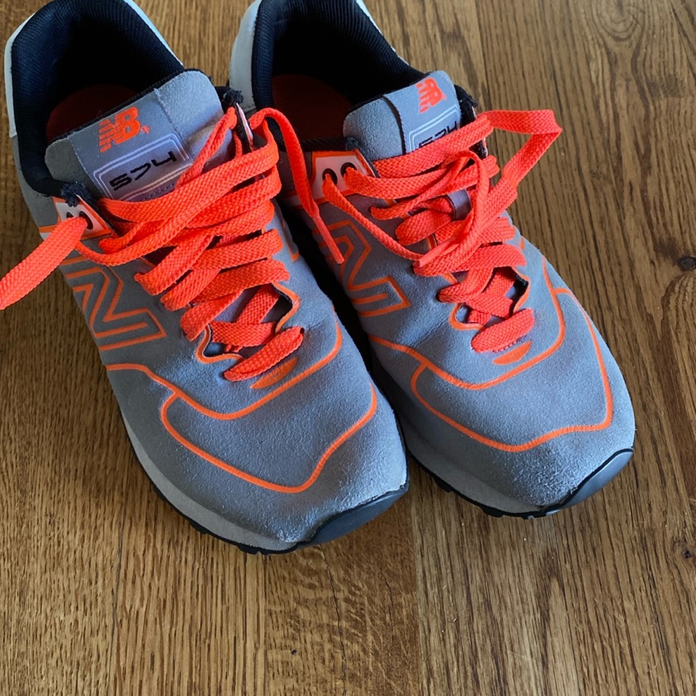 Fun and Comfortable! New Balance 574 light grey and neon orange size 6.5 womens